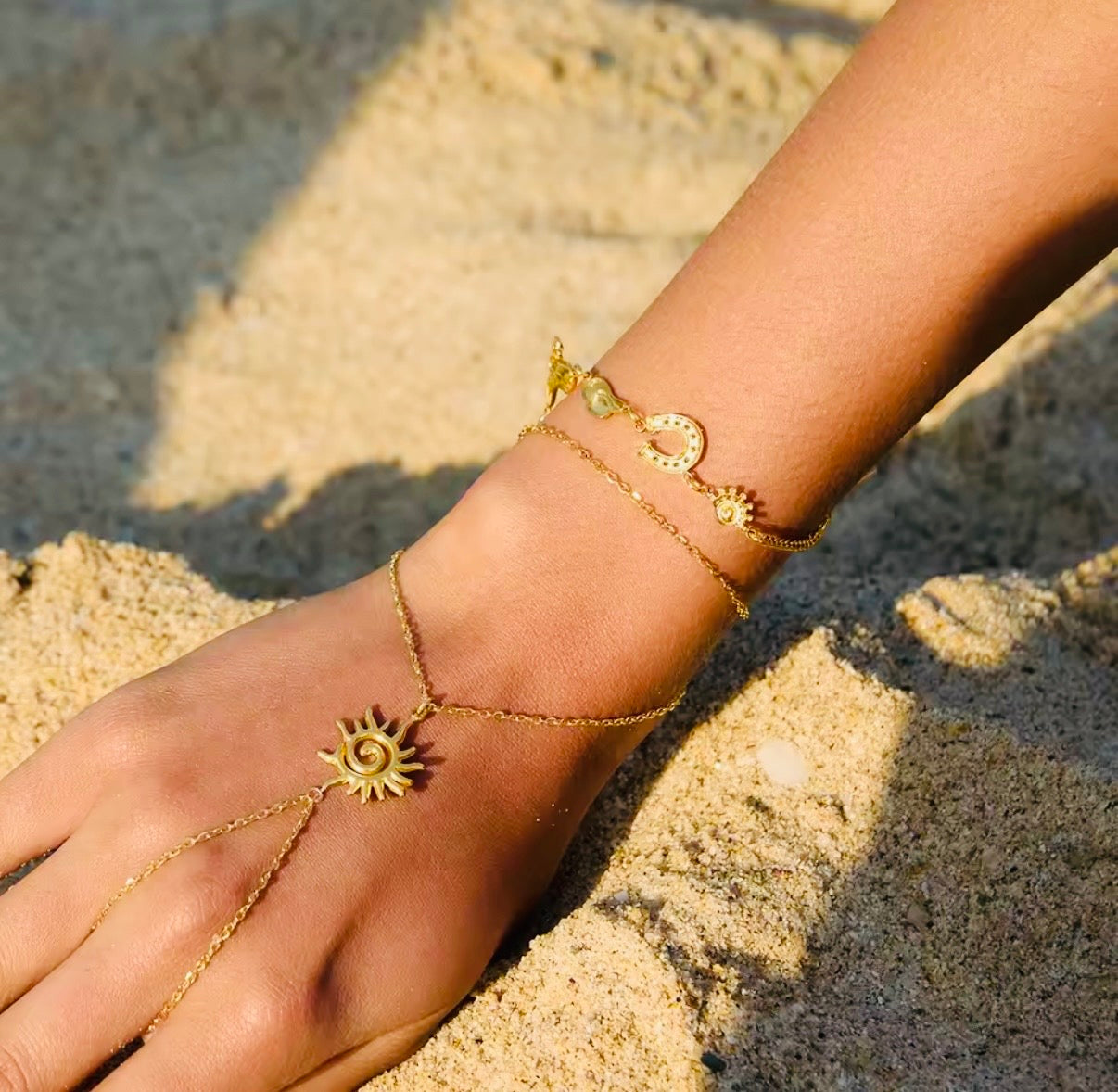 Sun Swirls Stainless Steel Hand Chain Bracelet